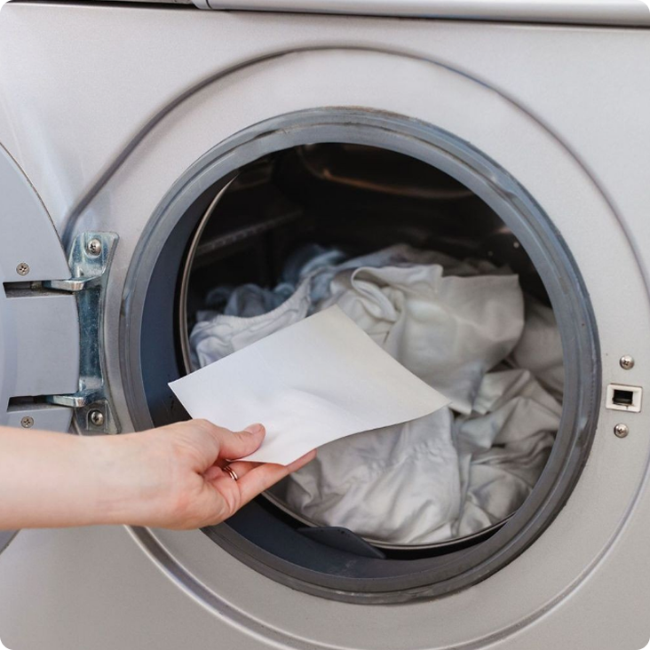 Adding a laundry sheet to a washing machine